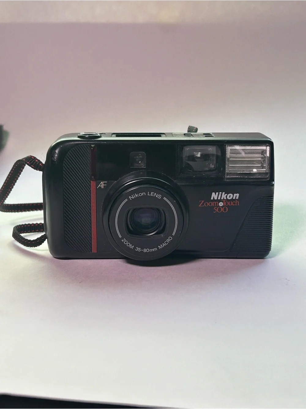 Nikon Zoom Touch 500 Film Camera in Black with Red Accent
